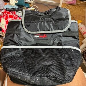 Black CAR having trash bag